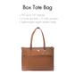 Stylish office tote bag in light-weight vegan leather with multiple pockets for organization.