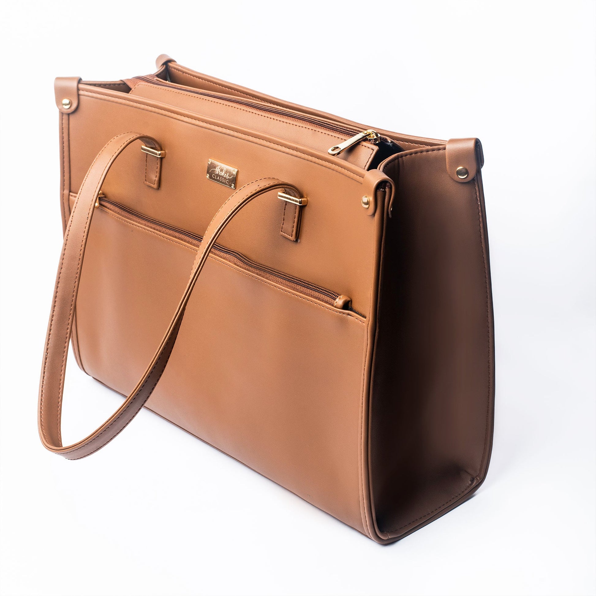 Stylish office tote bag in tan leather with multiple pockets for organization and sleek design
