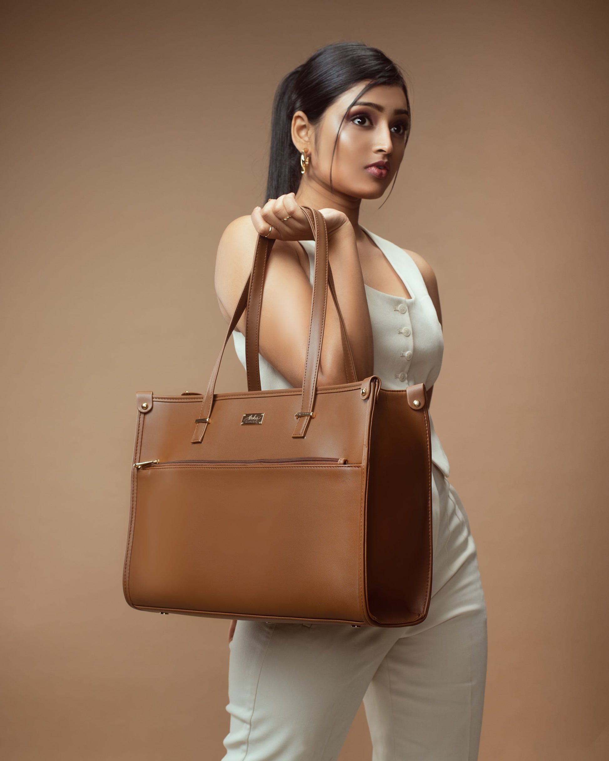 Stylish office tote bag in brown, perfect for professional outfits and everyday use