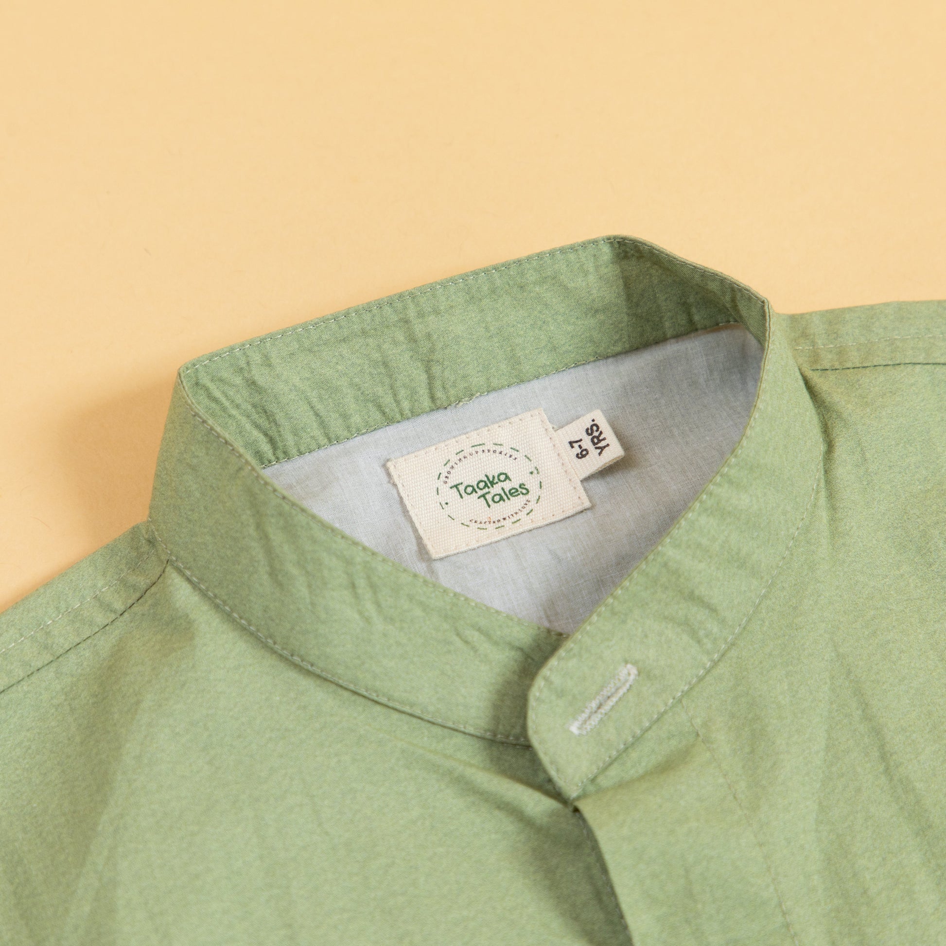 Stylish olive button up shirt by Stylera featuring a classic collar and soft fabric