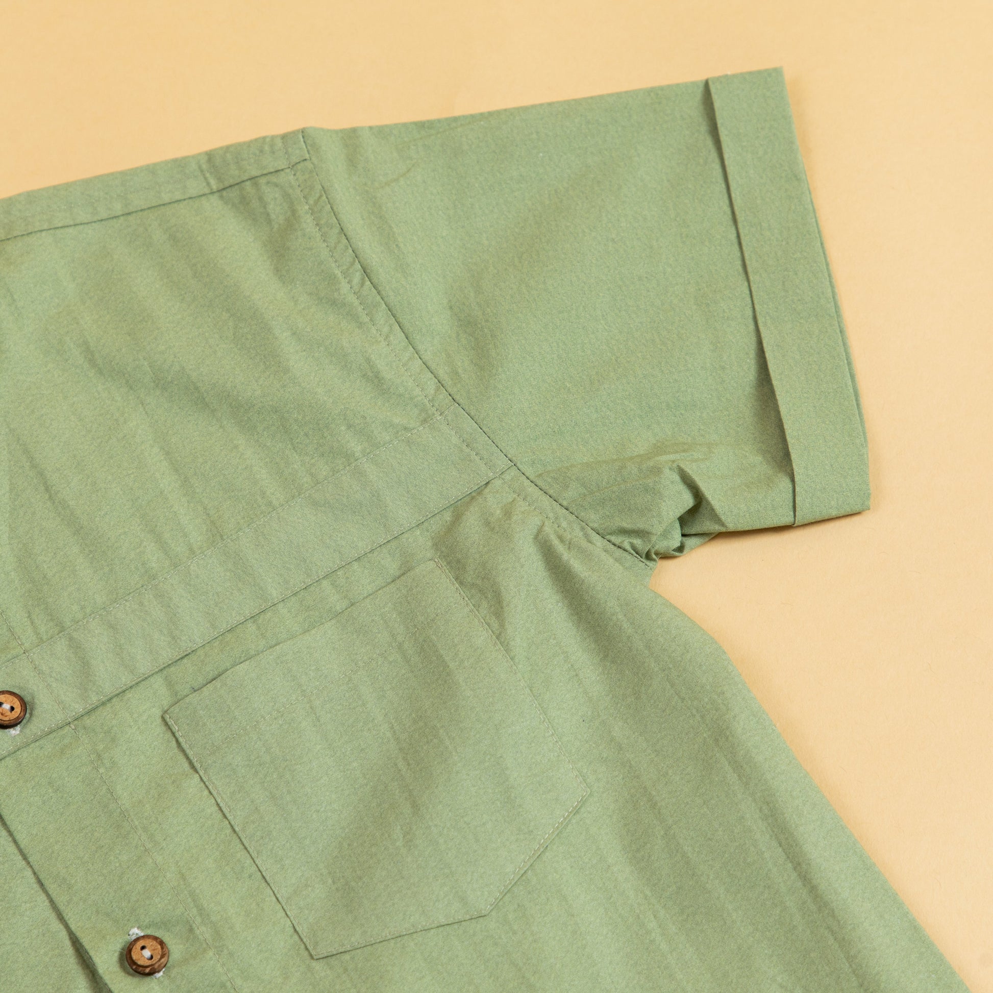 Stylish olive button up shirt from Stylera featuring short sleeves and a chest pocket