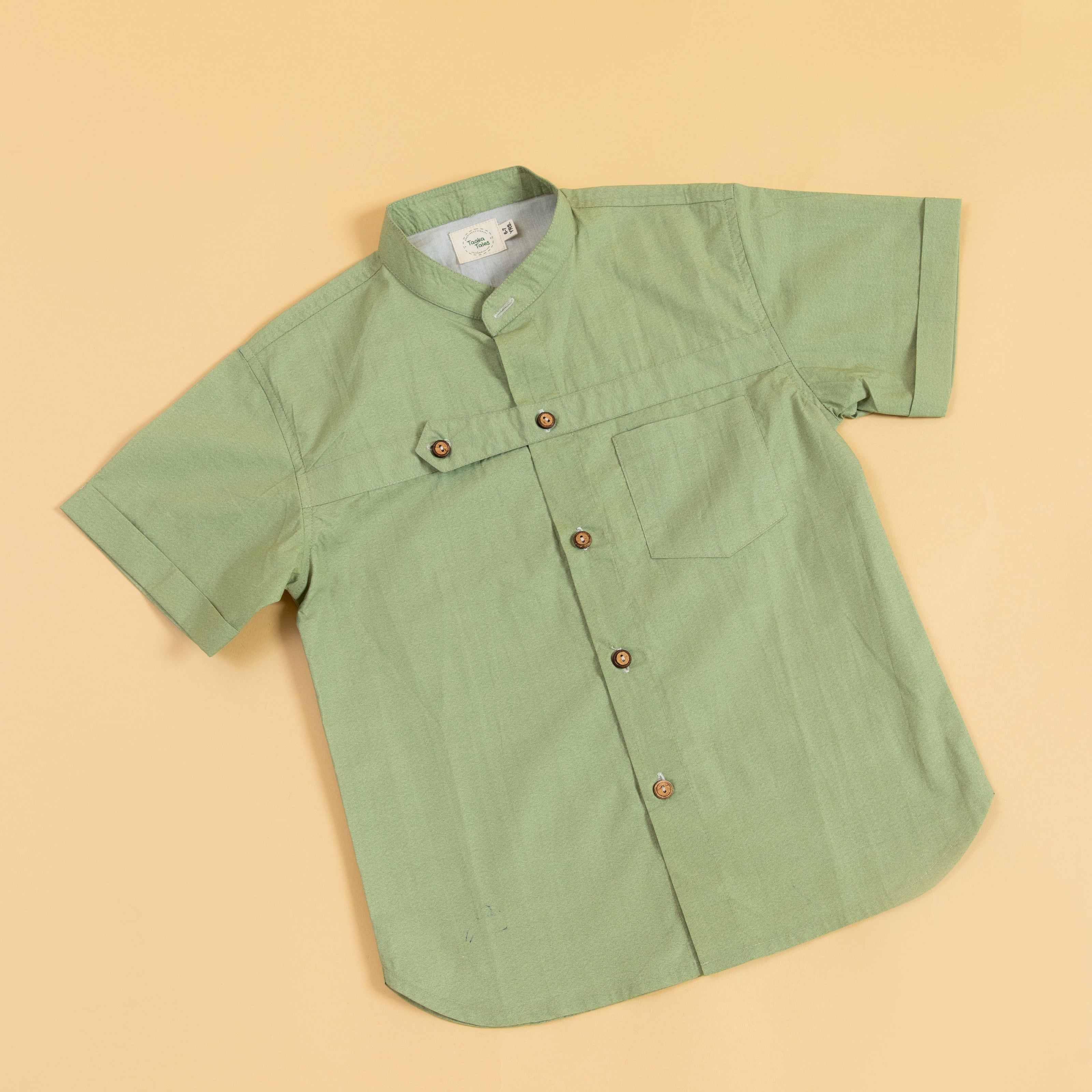 Stylish olive button up shirt from Stylera featuring a short-sleeve design and front pocket