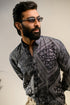 Stylish paisley print shirt for men by Stylera, featuring a modern design and tailored fit