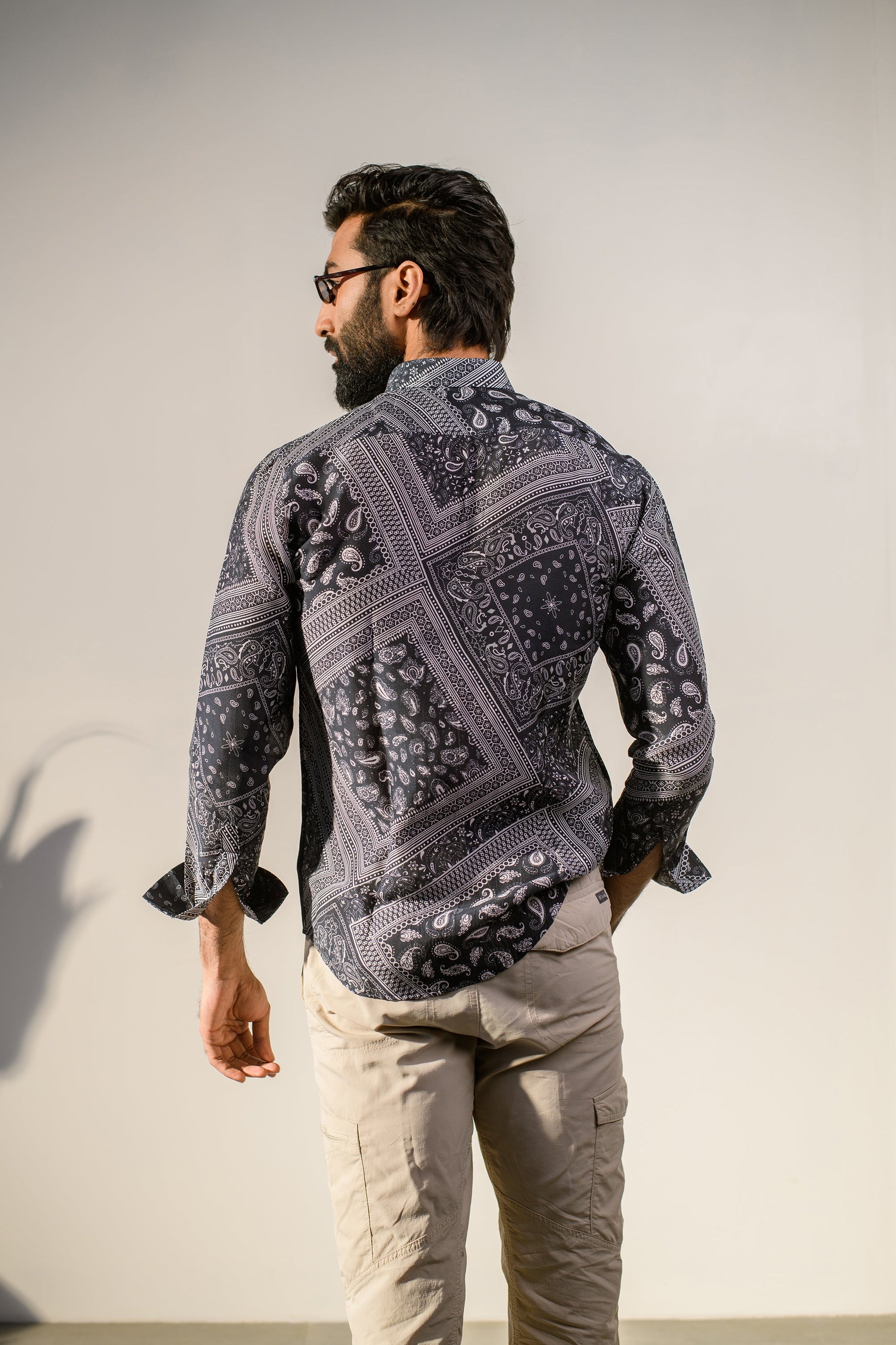 Stylish paisley print shirt for men in black and gray with a relaxed fit and long sleeves
