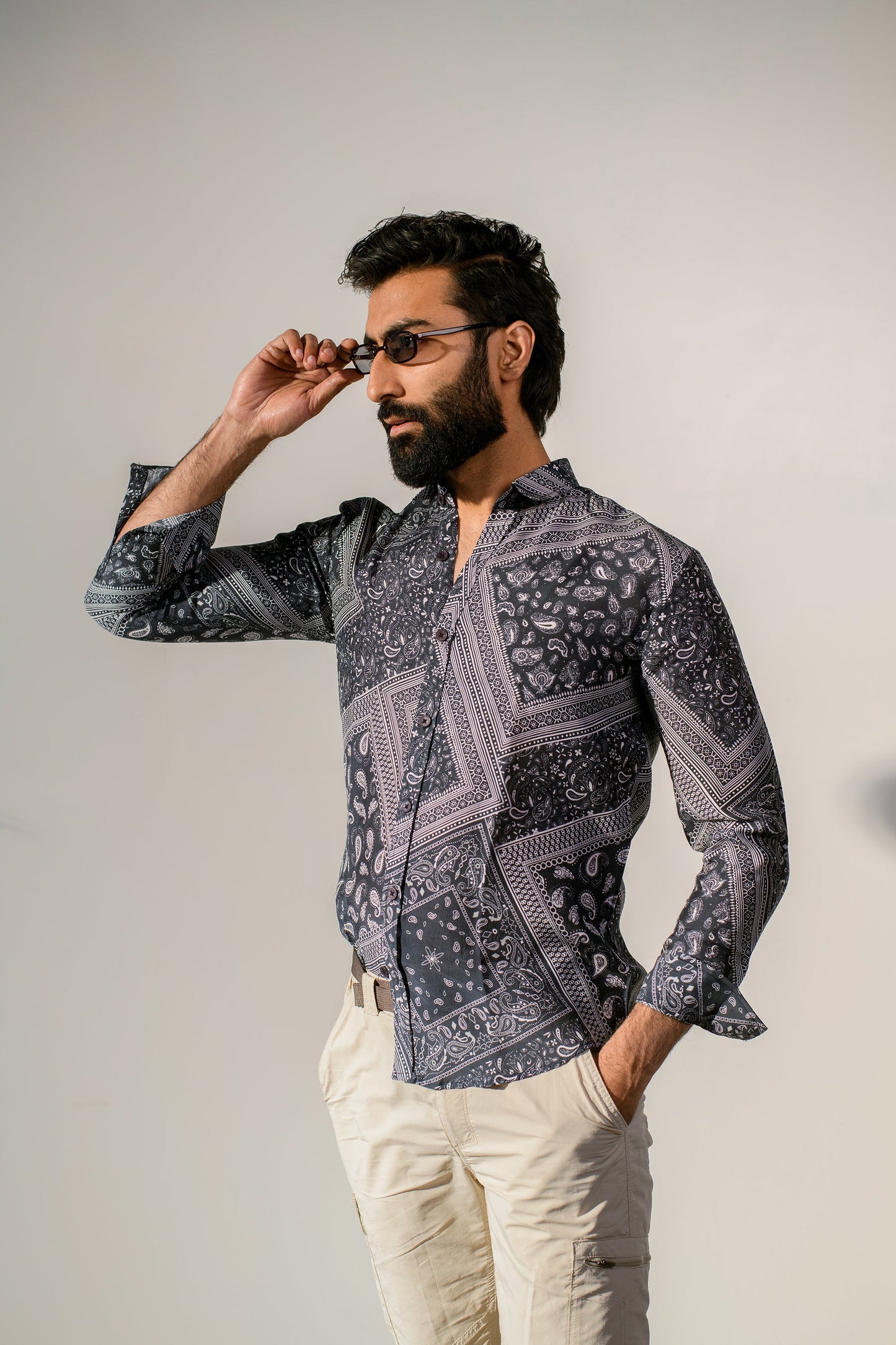 Stylish paisley print shirt for men by Stylera, featuring a unique pattern and modern fit