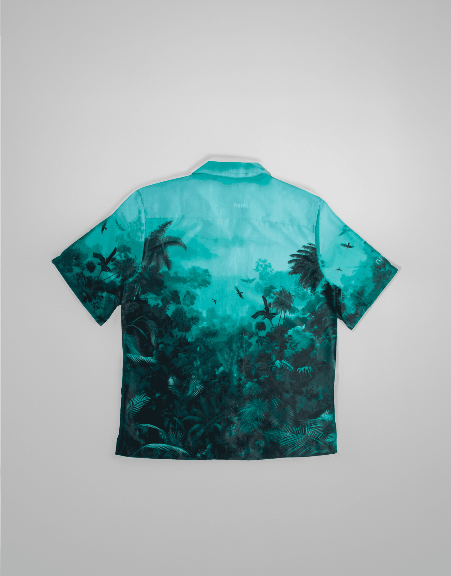 Stylera teal tropical back view stylish short sleeve resort shirt with jungle print ideal for beach vacations