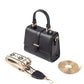 Stylish small shoulder bag for women in black with gold accents and detachable strap