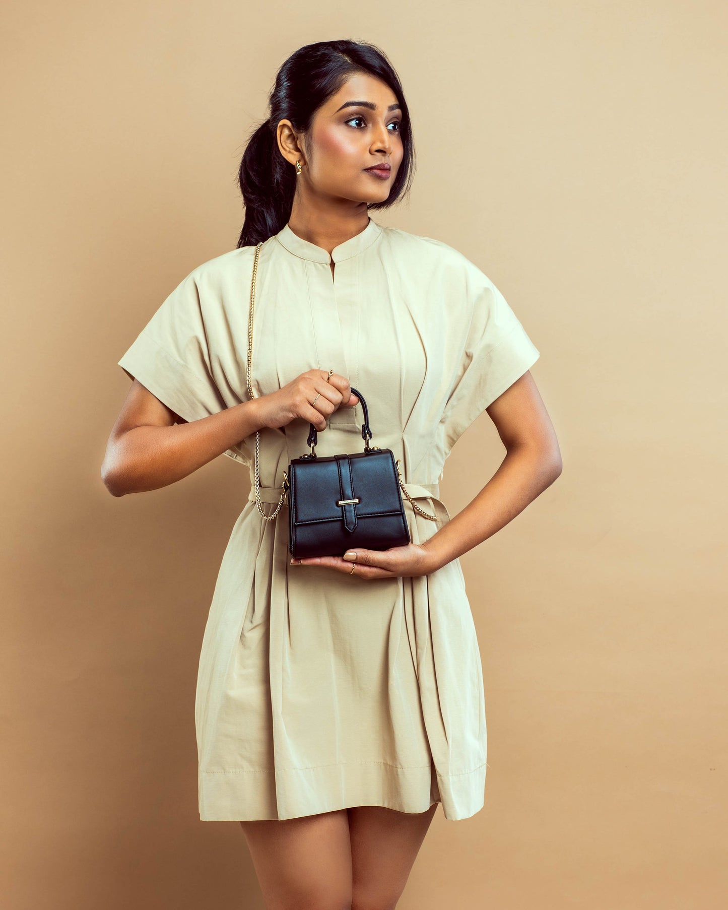 Stylish small shoulder bag for women in black, perfect for chic outfits and daily use