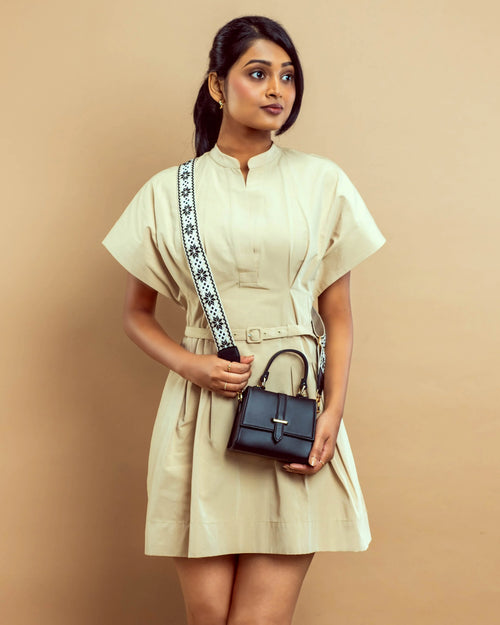 Stylish small shoulder bag for women by Stylera, paired perfectly with a chic beige dress