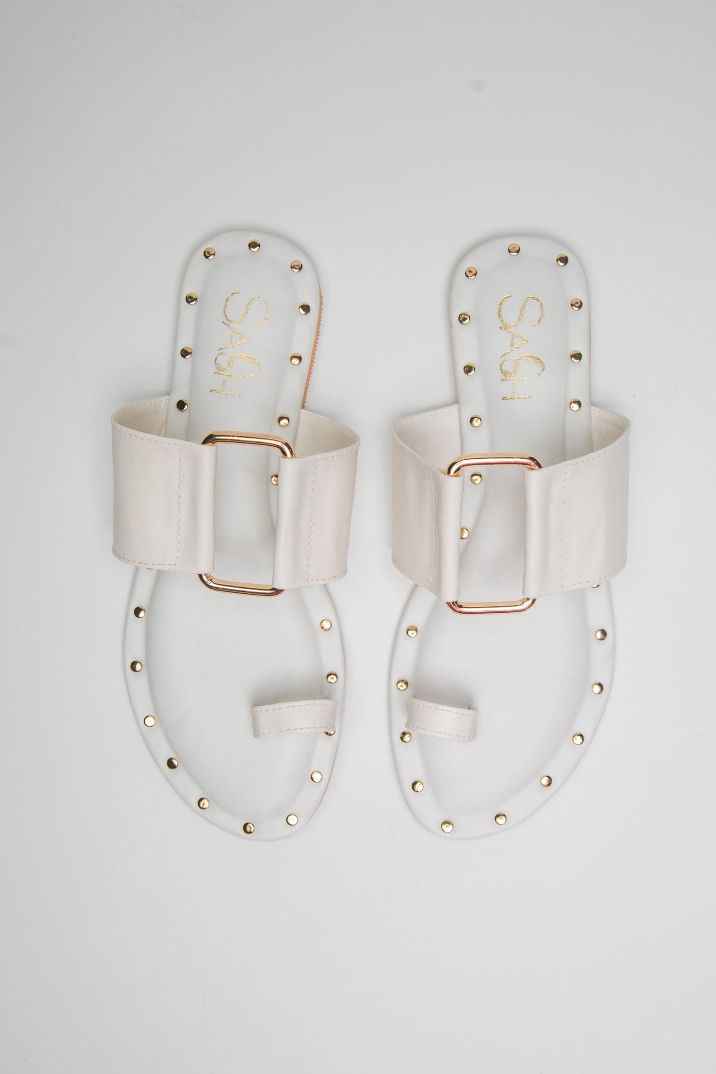 Stylera stylish summer slip on flats in white with gold studs and buckle detail