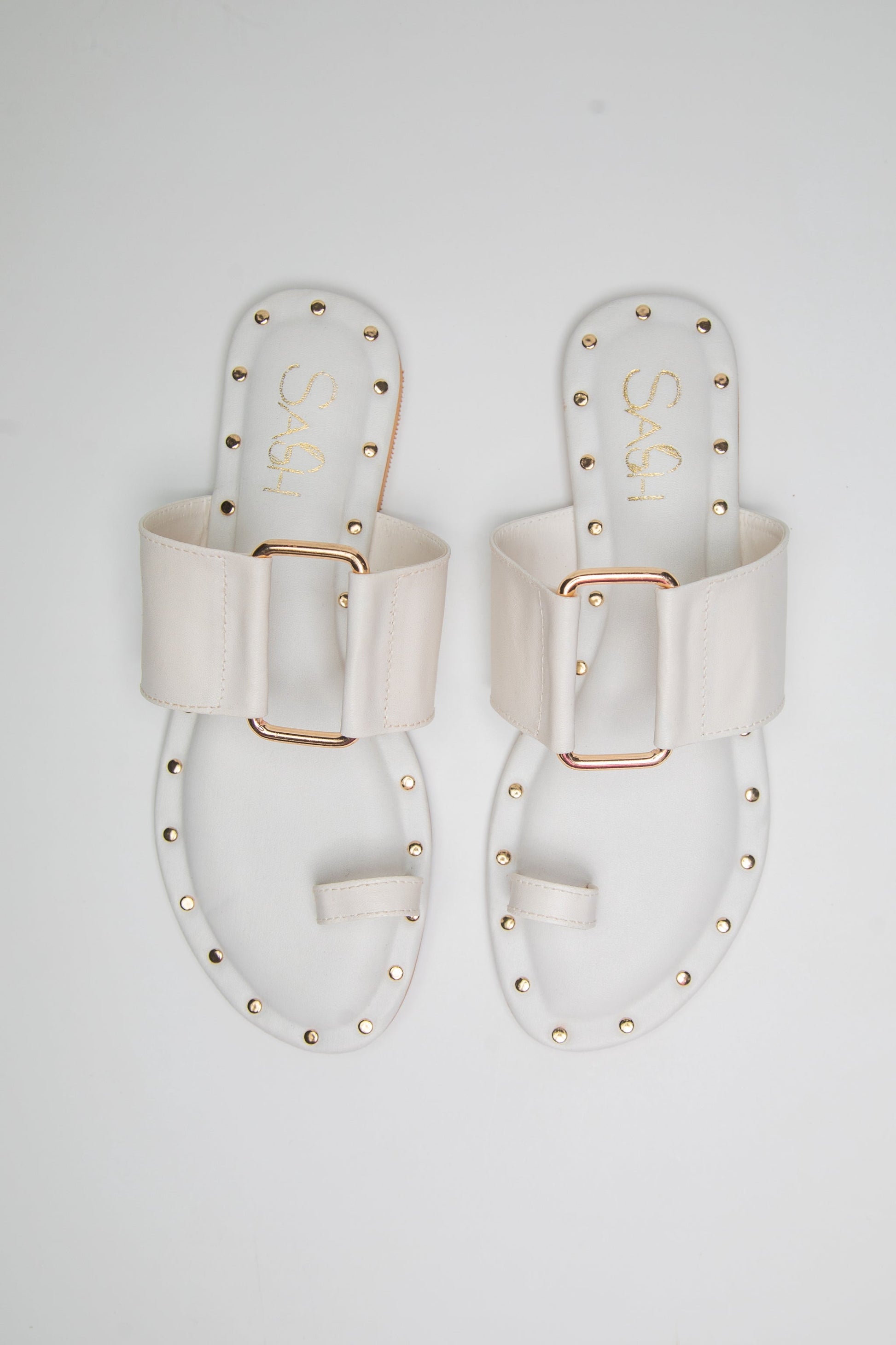 Stylera stylish summer slip on flats in white with gold studs and buckle detail