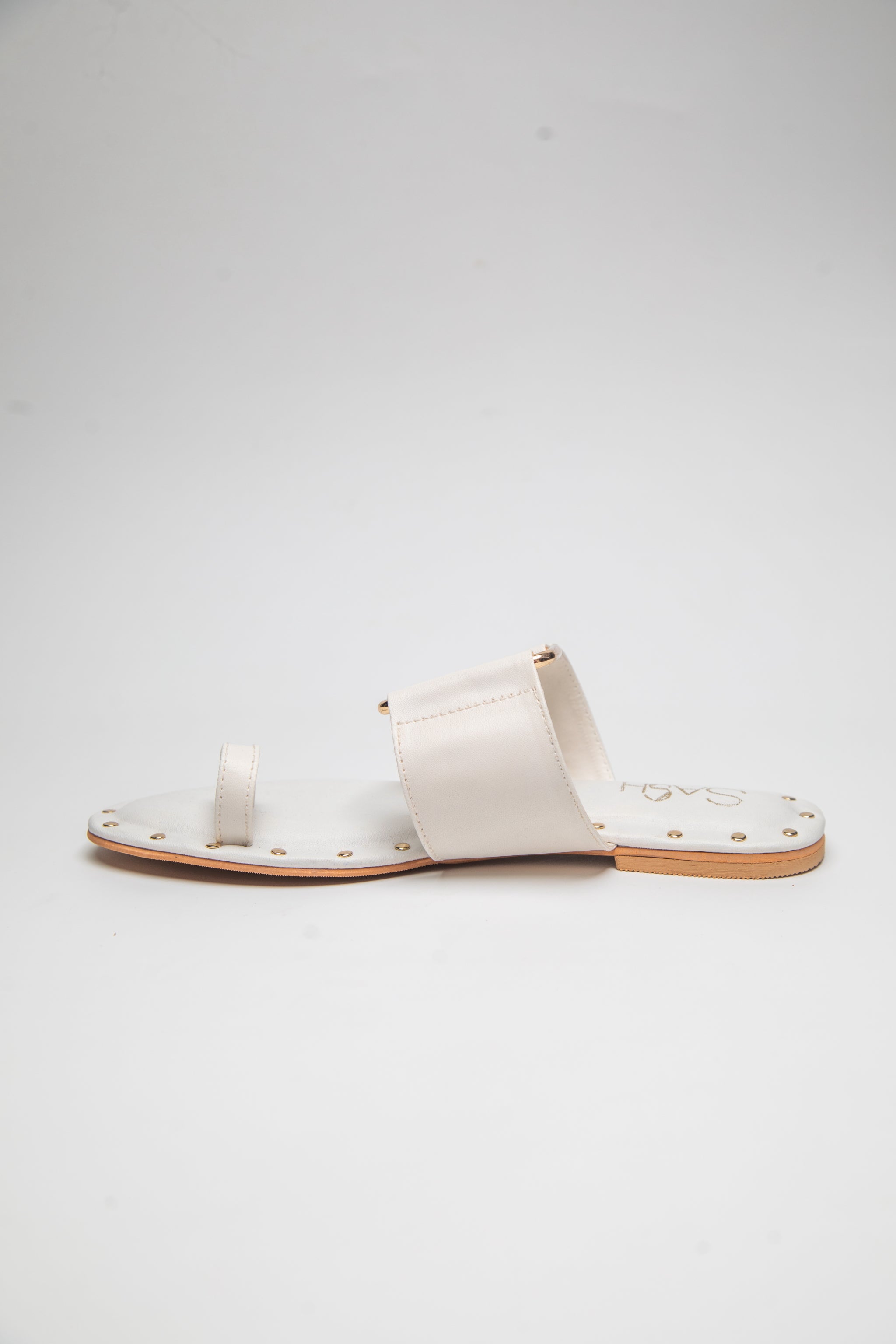 Stylera stylish summer slip on flats in white with toe loop and stud details