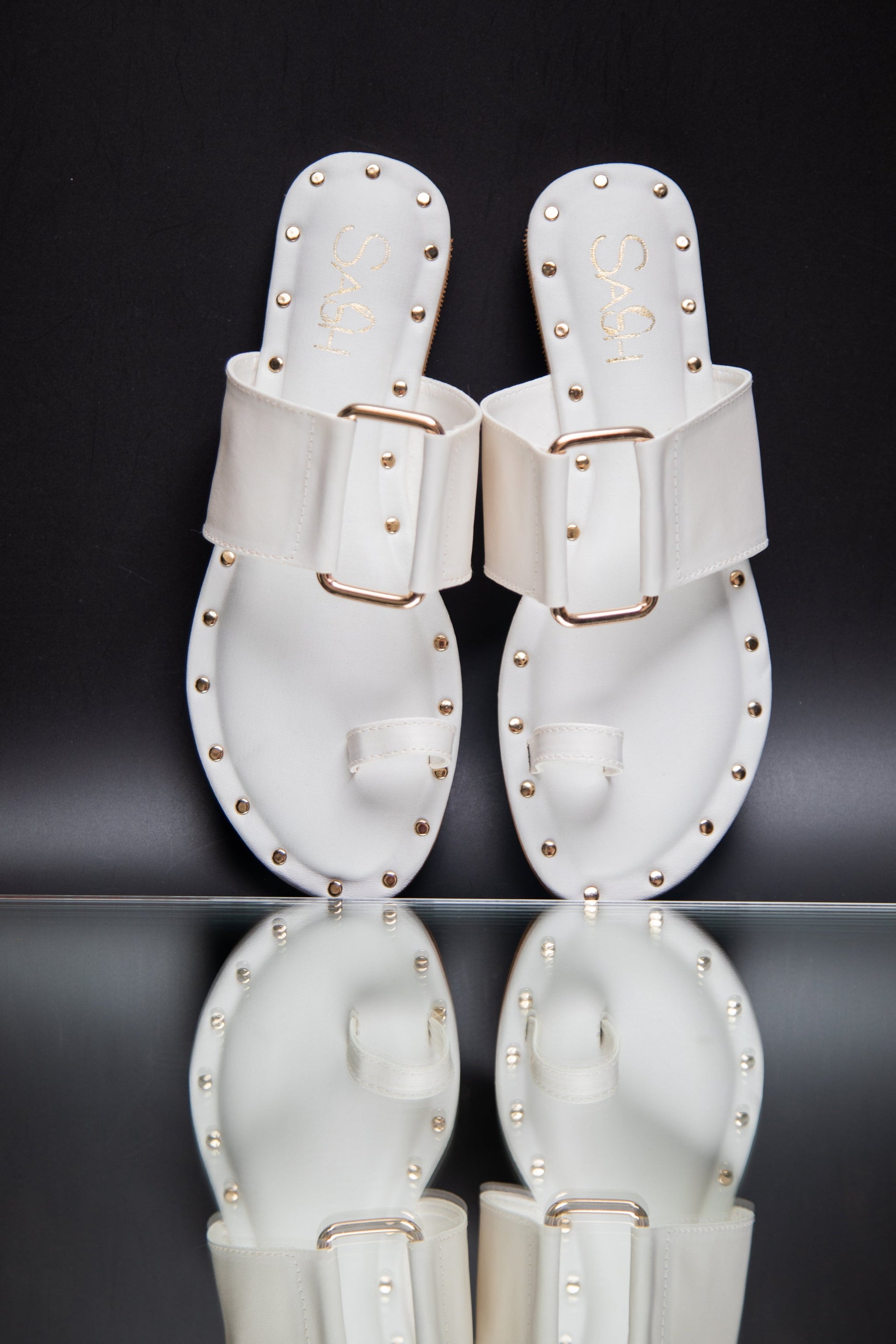 Stylera stylish summer slip on flats in white with gold stud accents and buckle detail