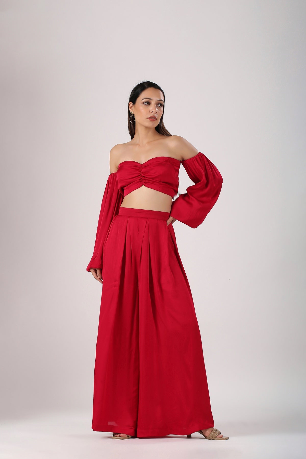 Stylish trendy matching sets for women featuring a red crop top and wide-leg pants