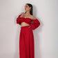 Trendy red matching set for women featuring a cropped top and wide-leg pants, perfect for stylish outings