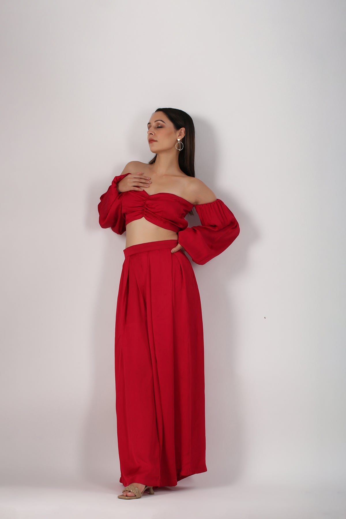 Trendy red matching set for women featuring a cropped top and wide-leg pants, perfect for stylish outings