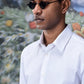 Stylish white shirt for men by Stylera worn by a man with black sunglasses