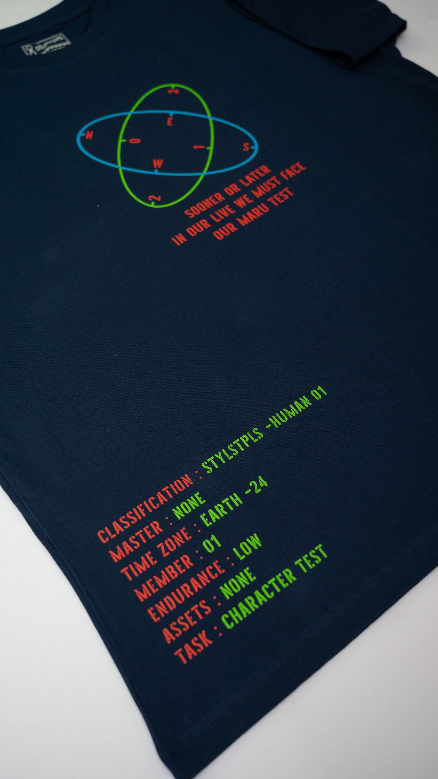 Stylstpls navy blue oversized t-shirt featuring colorful text and graphic design for casual wear