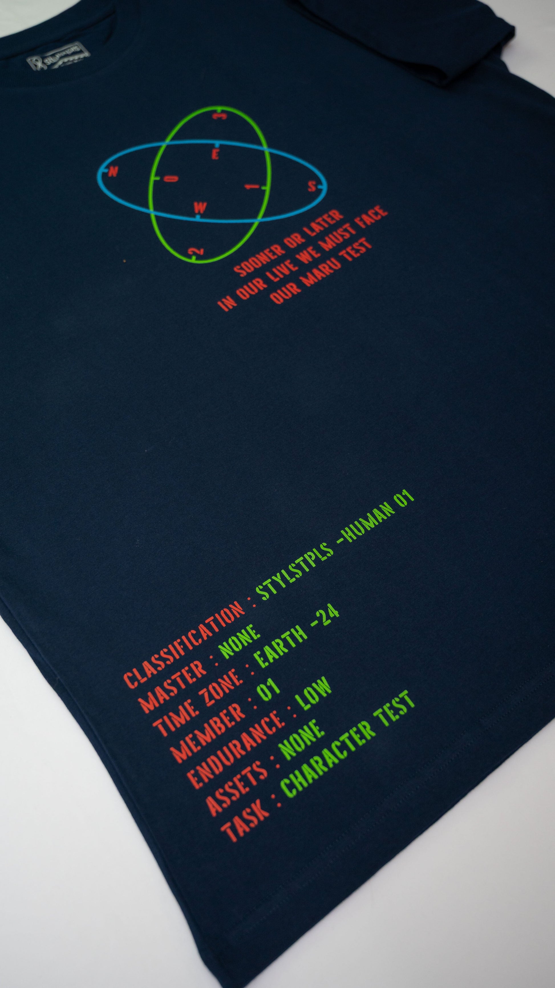 Stylstpls navy blue oversized t-shirt featuring colorful text and graphic design for casual wear