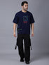 Stylstpls navy blue oversized t-shirt featuring a colorful graphic design and relaxed fit