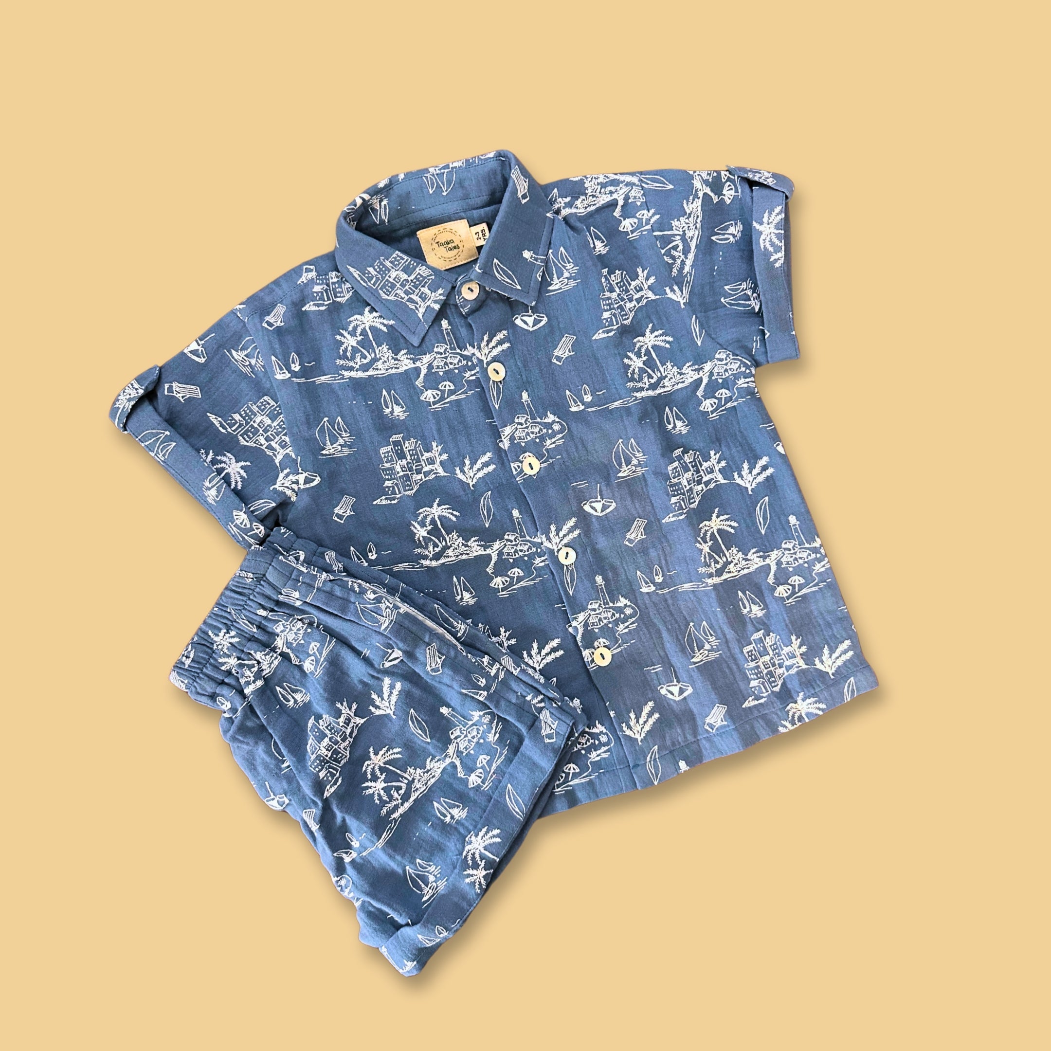 Stylera summer clothing set for boys featuring a blue shirt and matching shorts with a fun nautical print