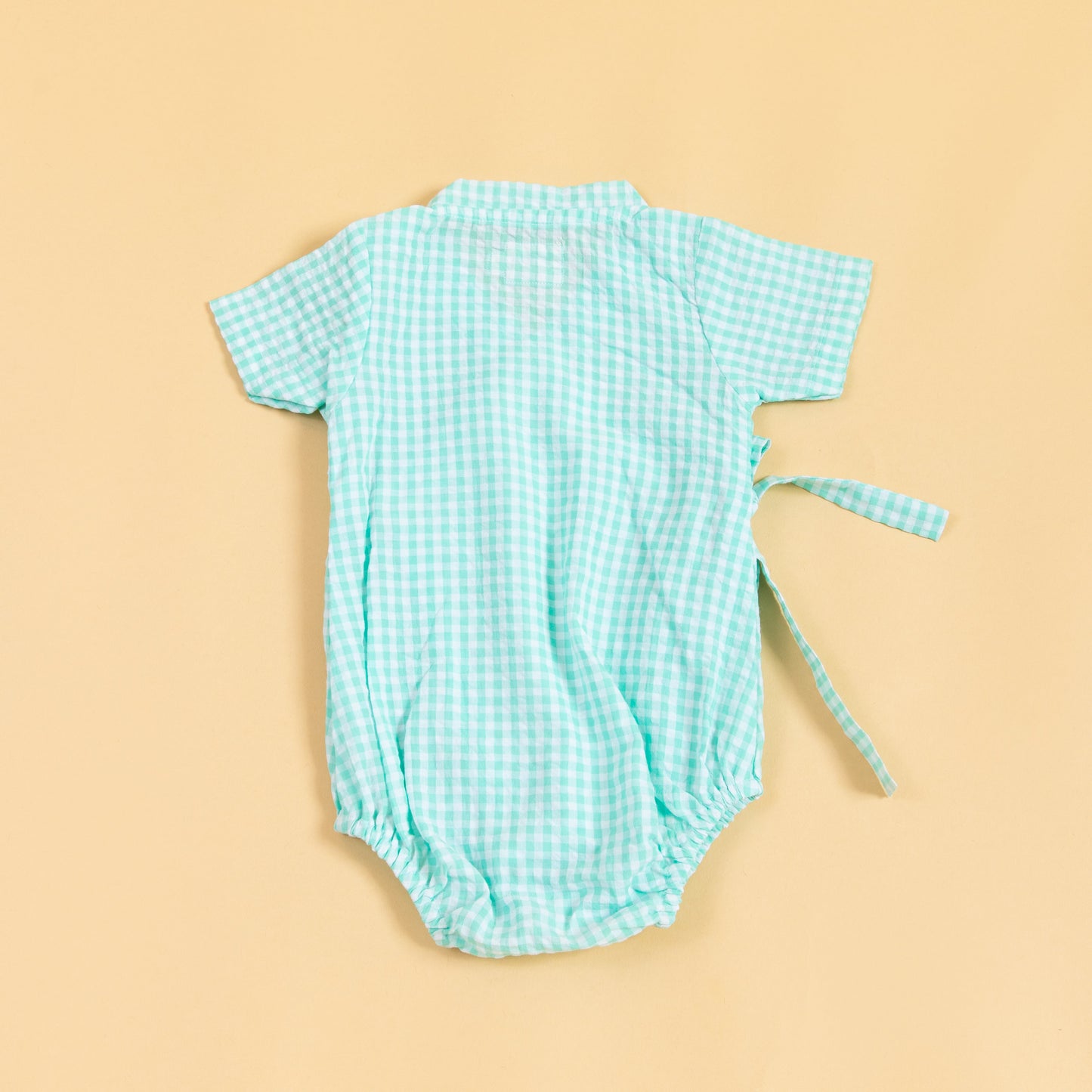 Light blue checkered summer kimono romper for infants with short sleeves and tie details