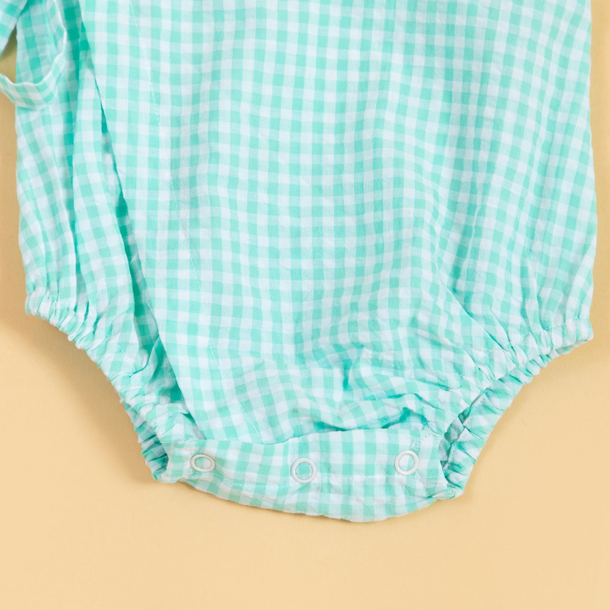 Light blue checked summer kimono romper for infants with snap closure for easy dressing