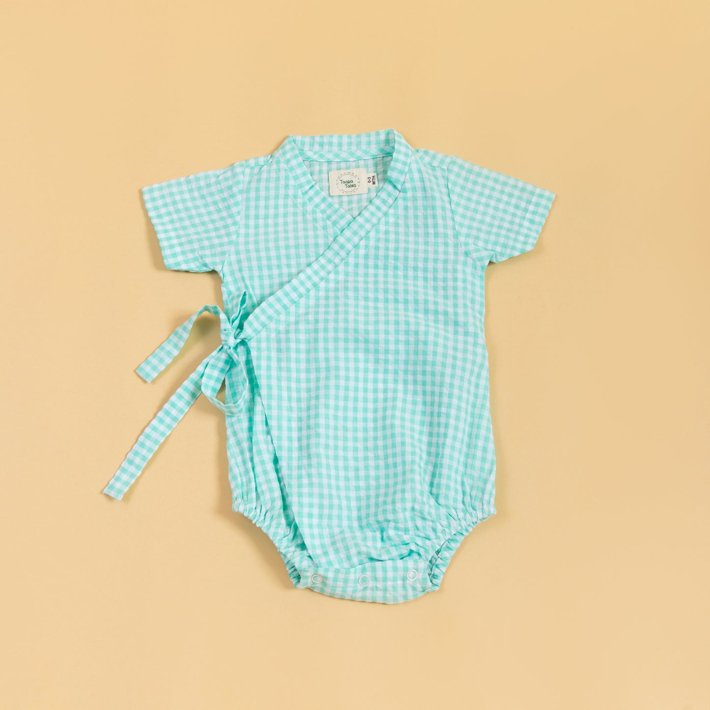 Cute teal gingham summer kimono romper for infants with wrap-style and tie detail