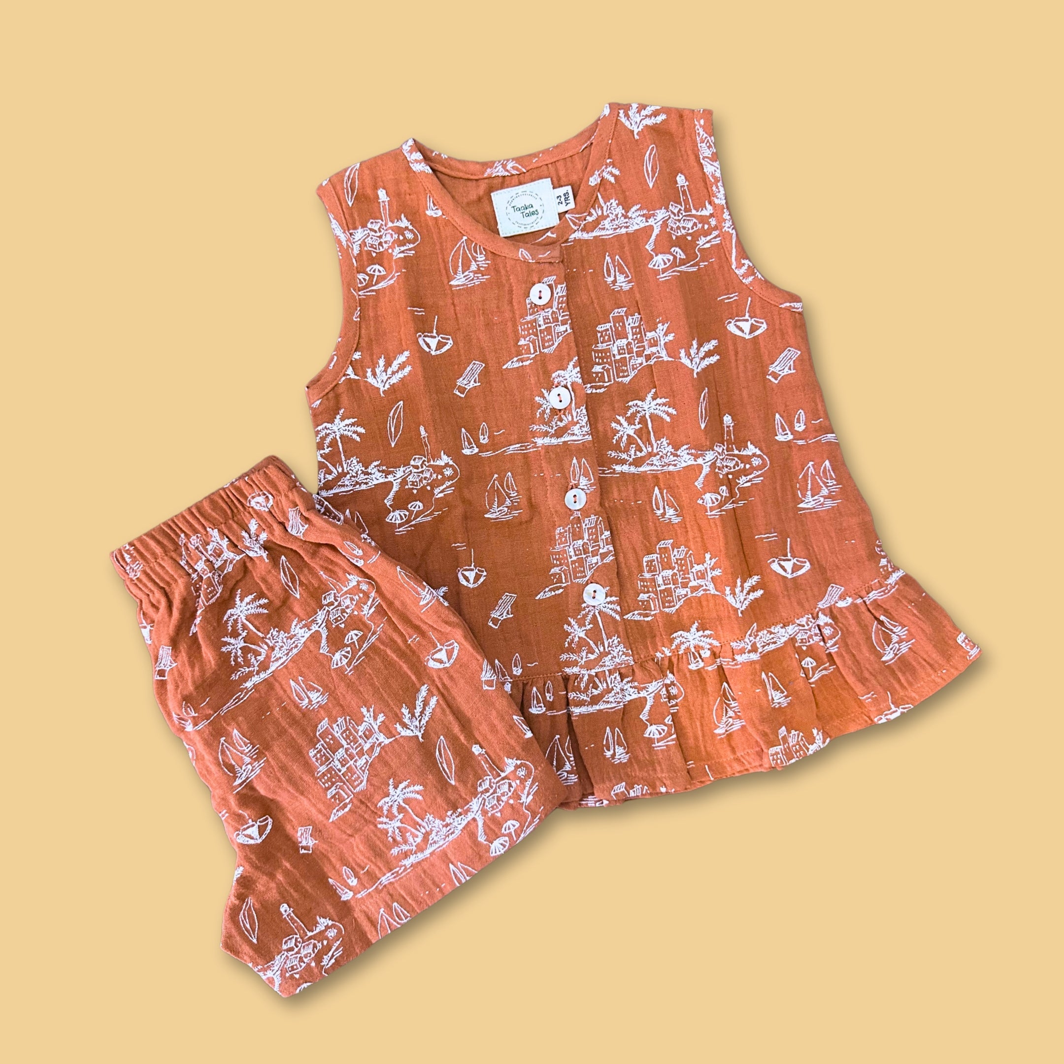 Stylera summer outfits for girls featuring a coral sleeveless top and matching shorts with beach designs