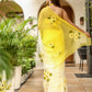 Elegant sunflower saree for women featuring a vibrant yellow hue with floral designs