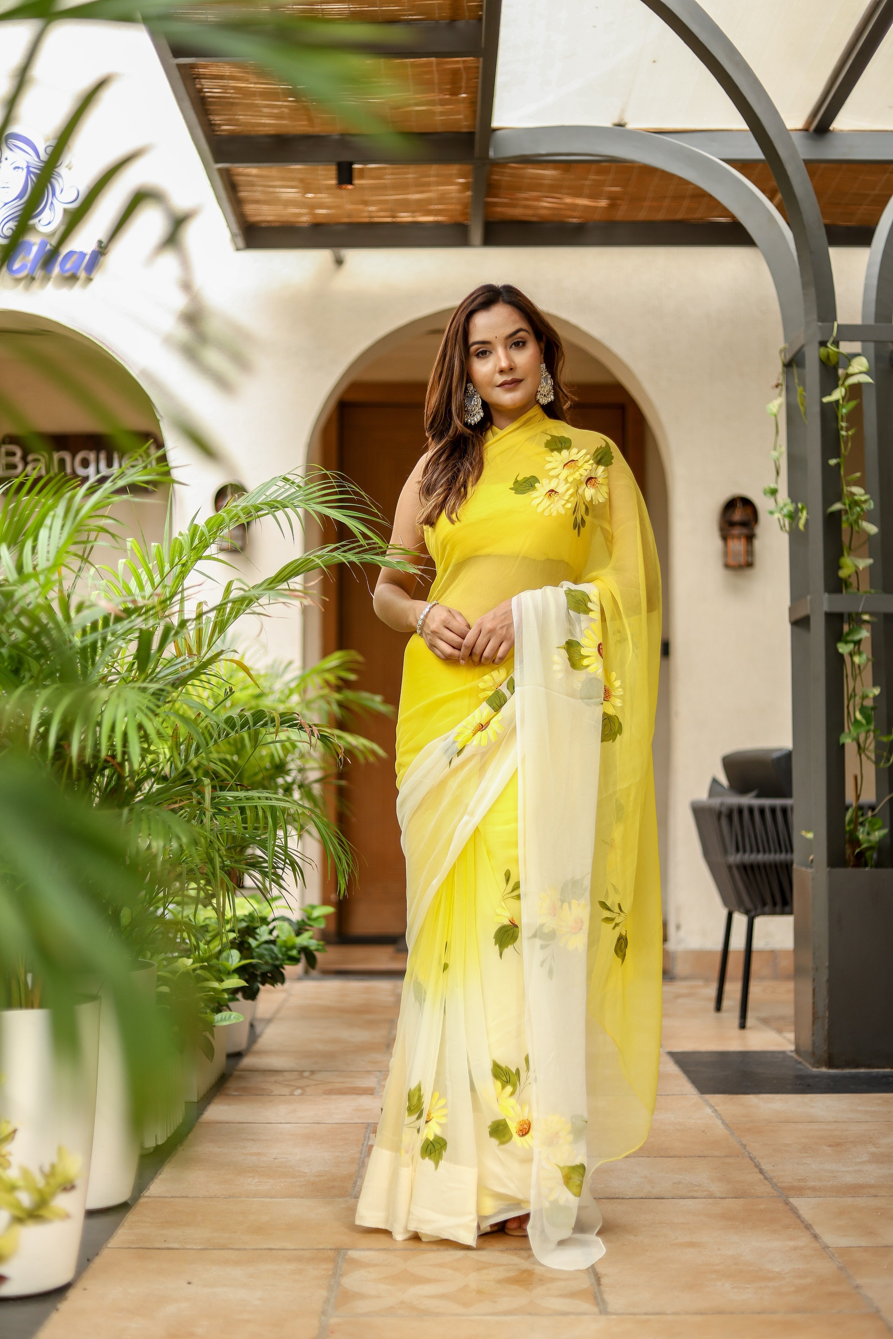 Elegant sunflower saree for women in yellow with floral embroidery for festive occasions