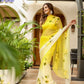 Elegant sunflower saree for women in yellow with floral accents, perfect for festive occasions