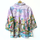 colorful long sleeve art shirt with pastel cityscape and palm tree print on lightweight relaxed button up back view