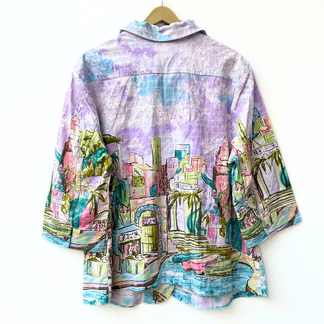 colorful long sleeve art shirt with pastel cityscape and palm tree print on lightweight relaxed button up back view