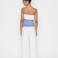 Stylera strapless blue and white swan lake inspired fashion top worn with white wide-leg pants