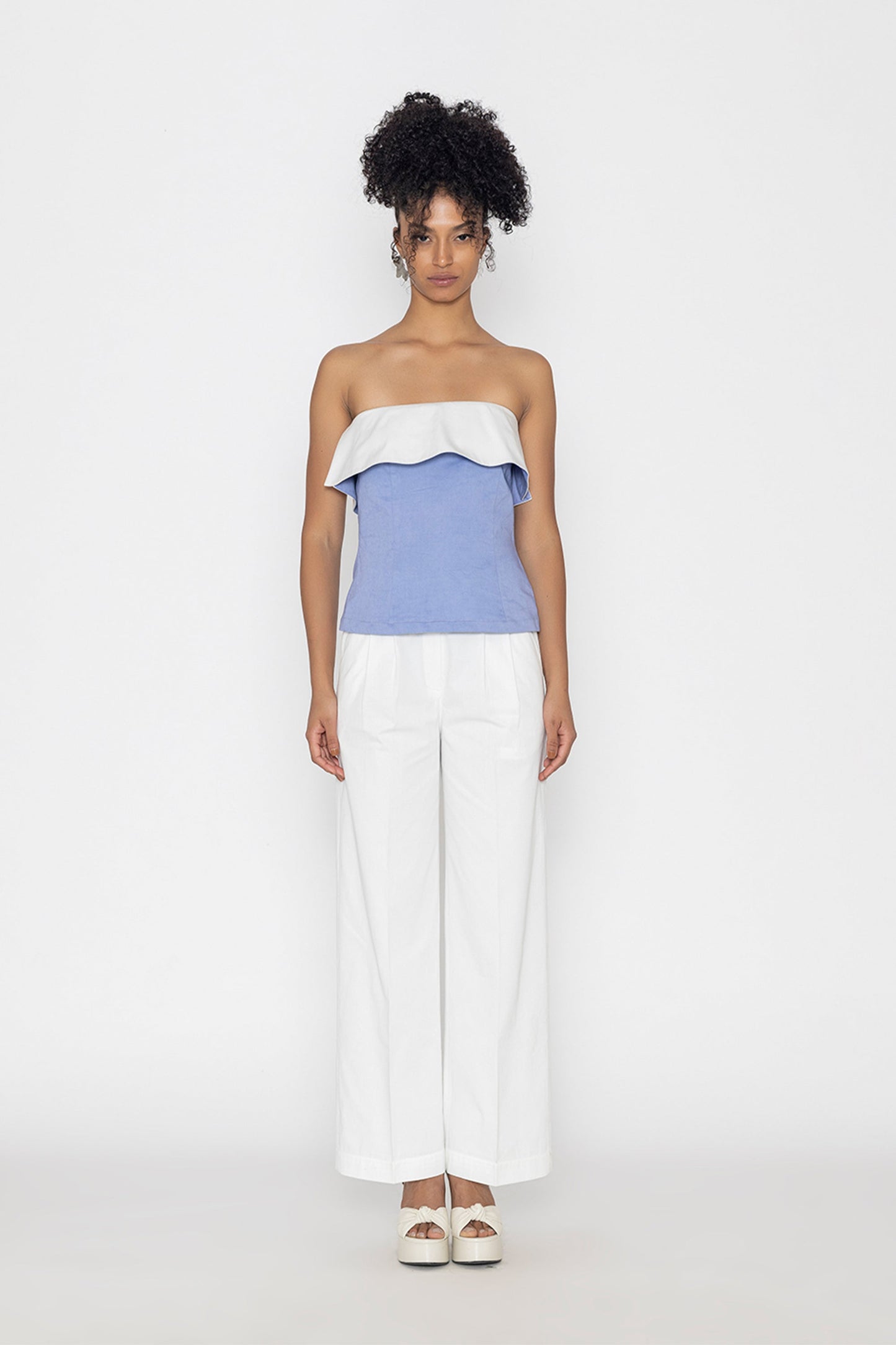 Swan lake inspired fashion top in blue and white strapless design paired with white wide-leg pants
