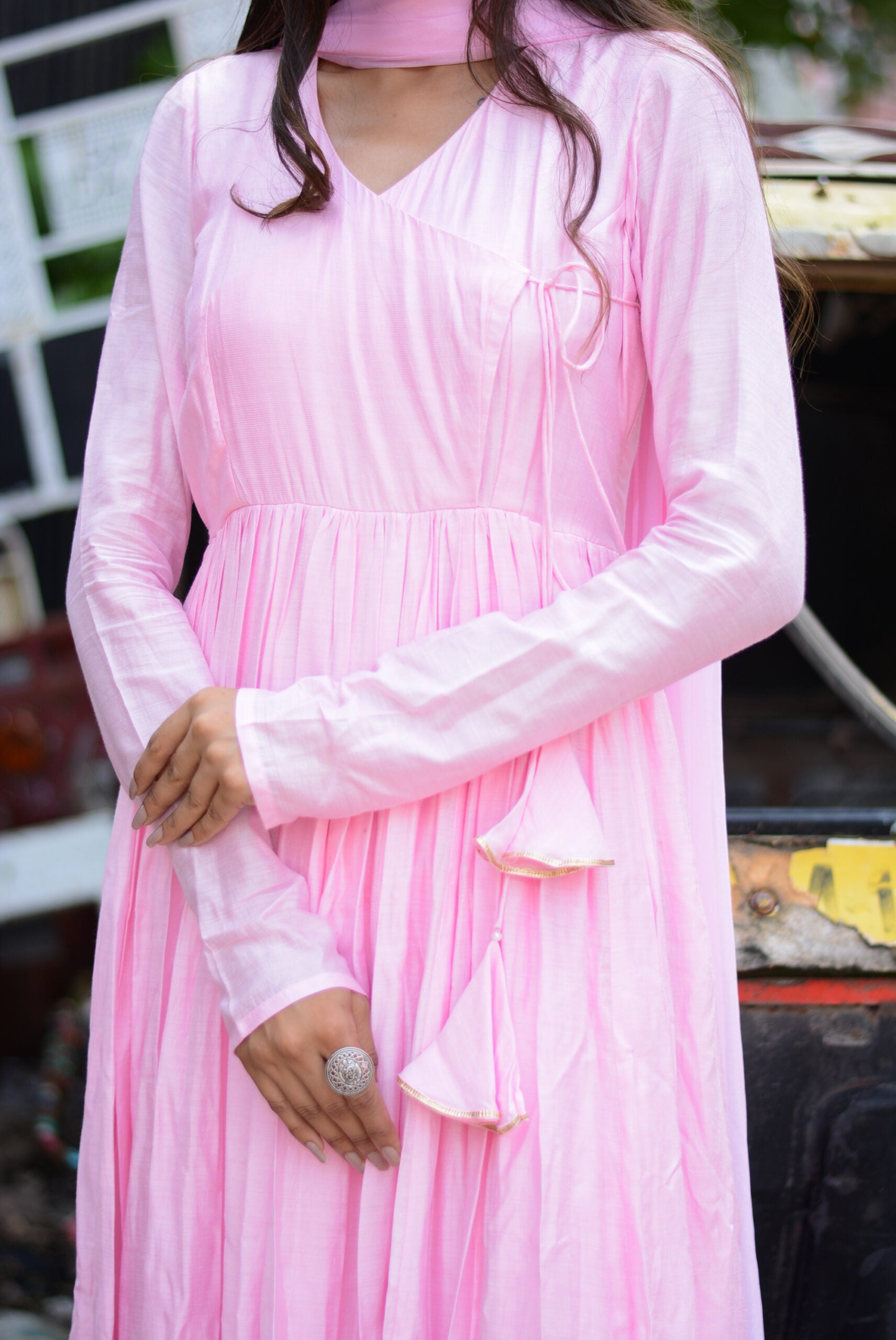 Elegant taffy pink anarkali suit set with delicate pleats and matching dupatta for festive occasions