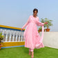 Elegant taffy pink anarkali suit set with a flowing design, perfect for festive occasions