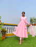 Elegant taffy pink anarkali suit set with intricate design, perfect for festive occasions