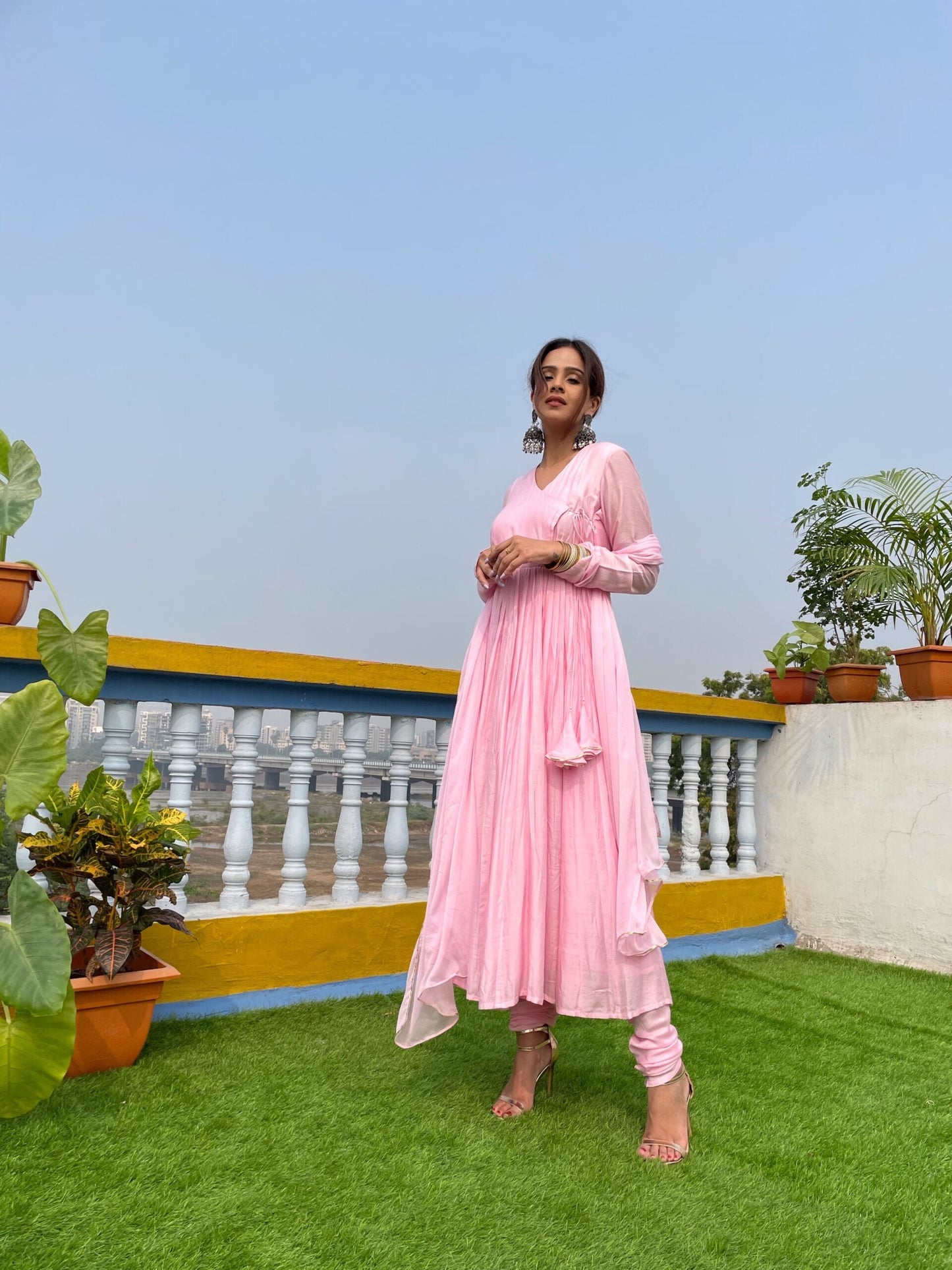 Taffy pink anarkali suit set featuring a flowing design and elegant styling for festive occasions