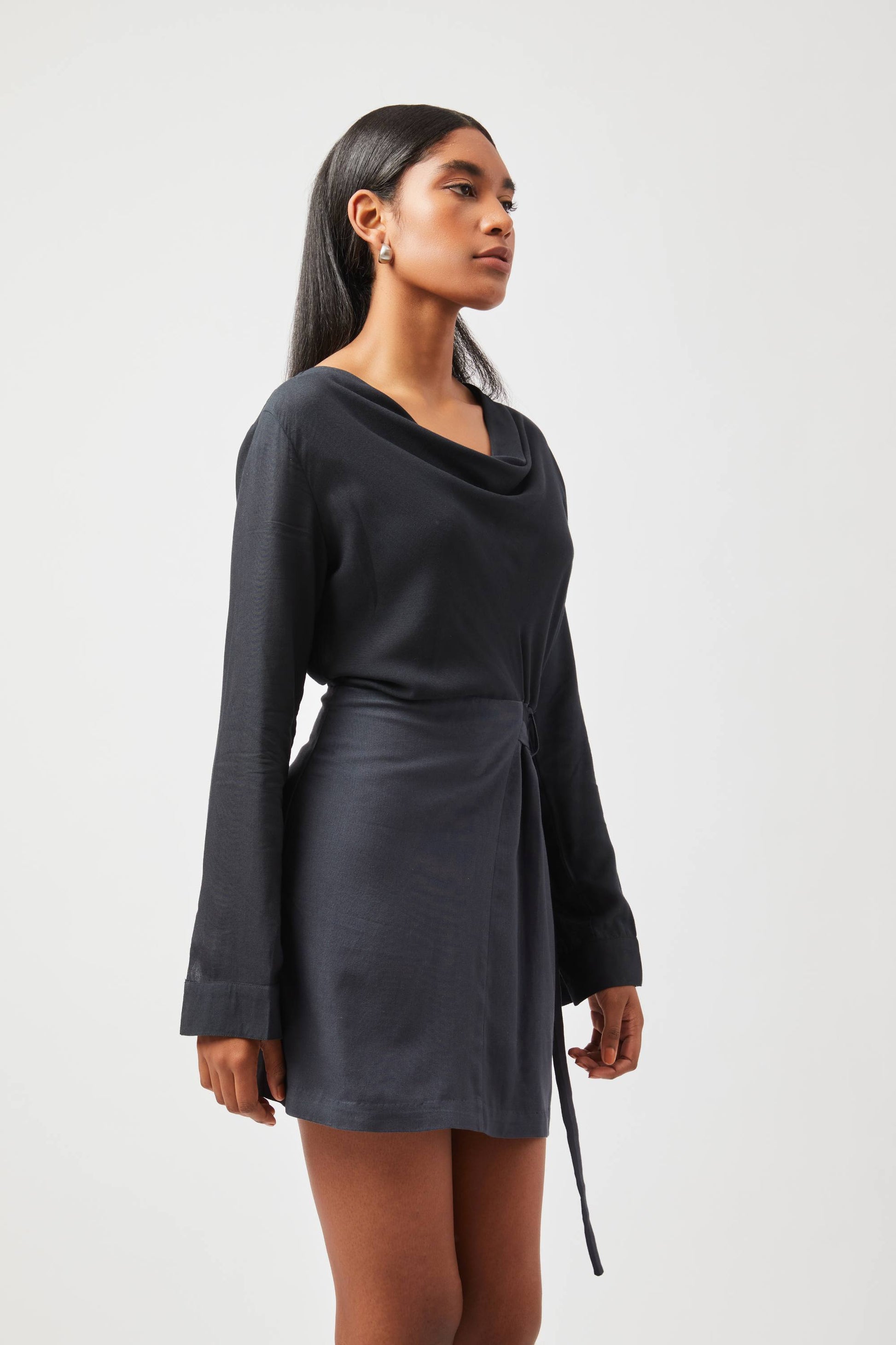 Stylera Tate cowl neck dress in black with long sleeves and waist tie detail