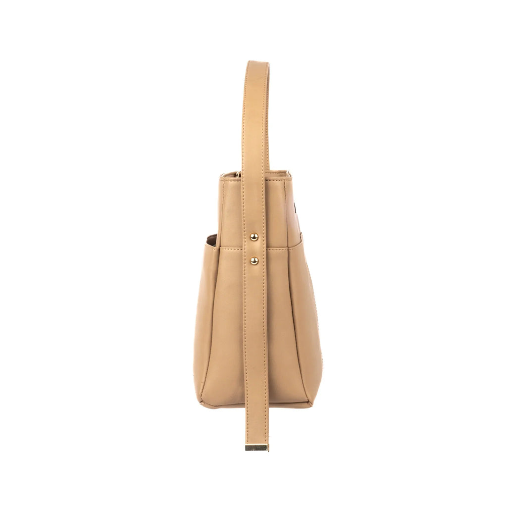 Side view of taupe bucket bag for women by Stylera, featuring a sleek design and comfortable strap