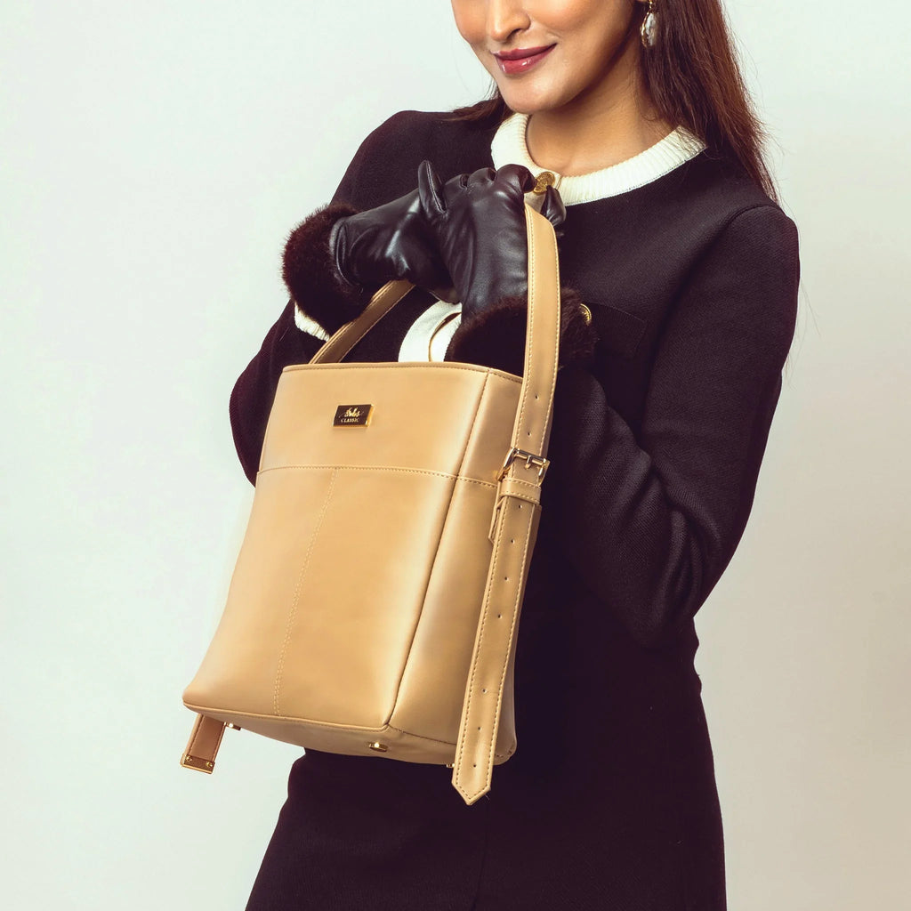 Stylish taupe bucket bag for women with a sleek design and adjustable strap by Stylera