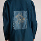 Teal cotton shirt for women with floral embroidery patch on the back by Stylera