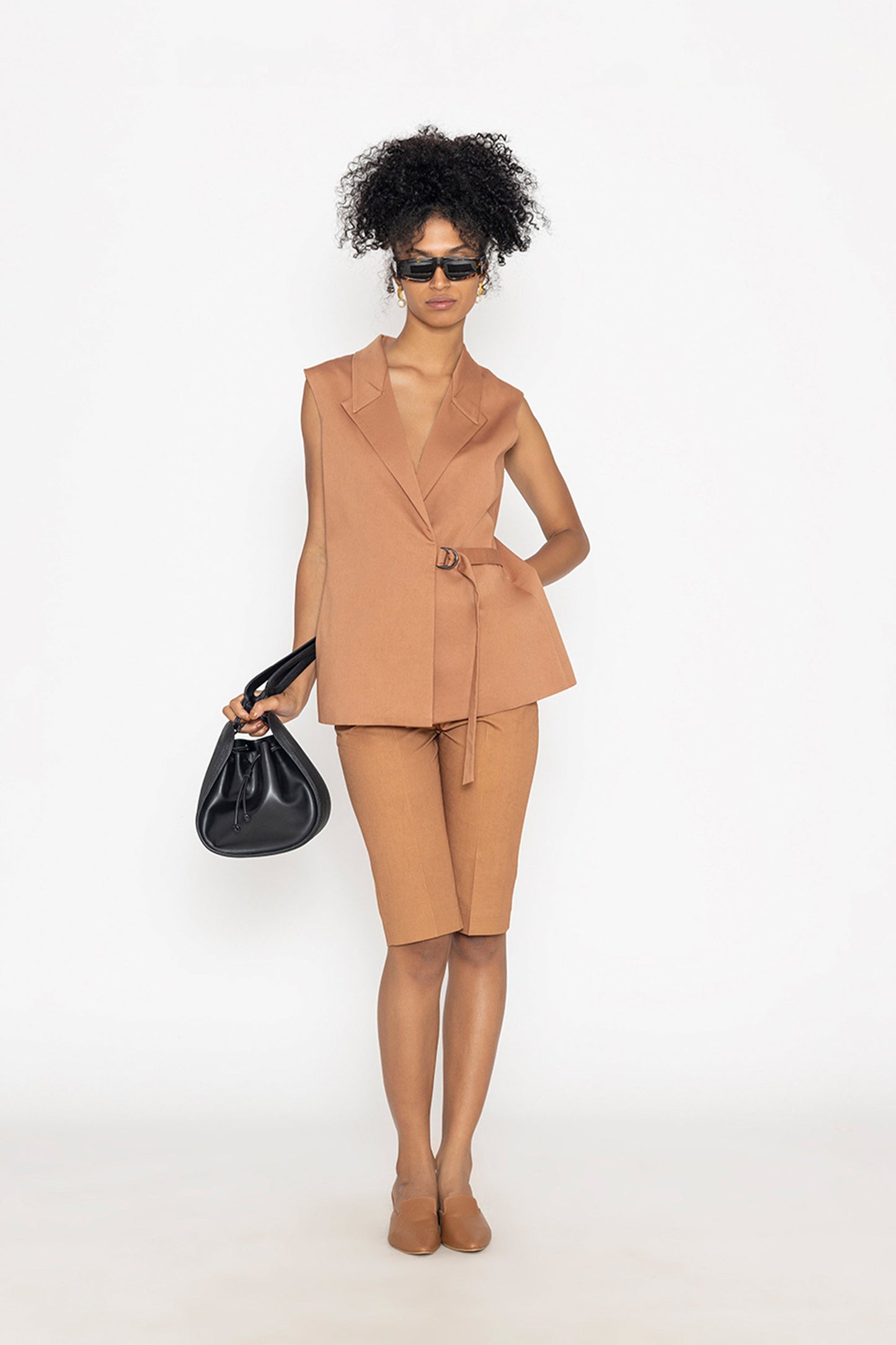 Stylera terra color fashion vest sleeveless wrap style paired with matching shorts and black handbag