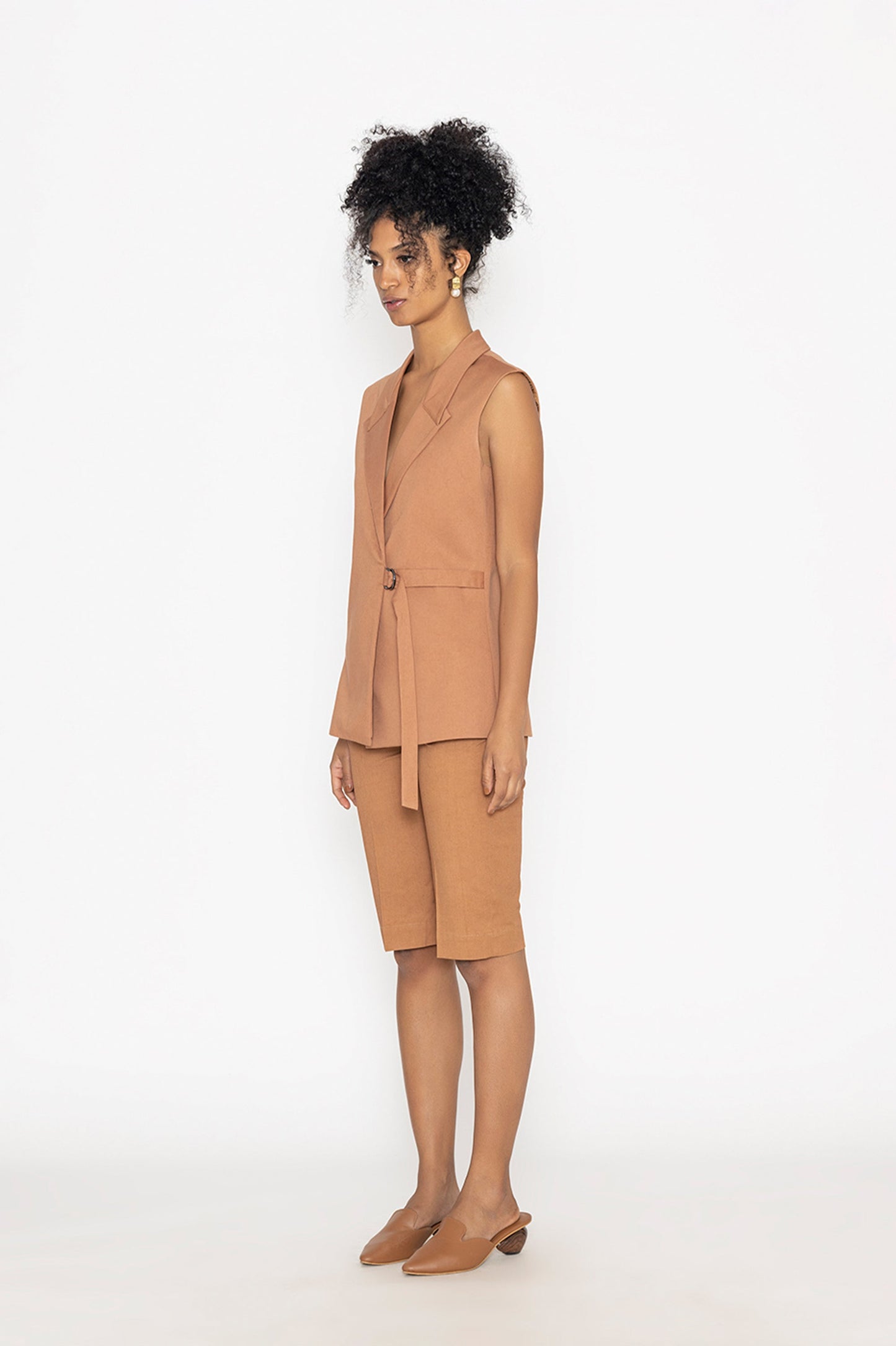 Stylera terra color fashion vest sleeveless tailored slim fit with belt styled on model