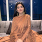 Elegant traditional Anarkali gown caramel with flowing silhouette and intricate drapes for special occasions