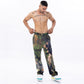 Stylera trendy abstract pattern pants in a camouflage design, perfect for casual and streetwear styles