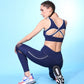 Stylera trendy athletic bra for women in navy blue with stylish cross-back design