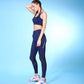 Navy set featuring a trendy athletic bra for women with matching leggings for activewear enthusiasts